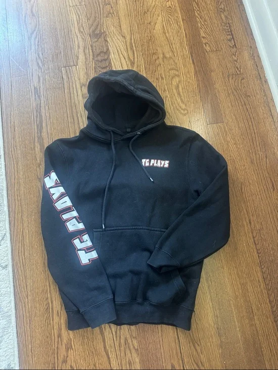 Black Pullover Hoodie with 'TG PLAYS' Sleeve Graphics - Picture 1 of 3